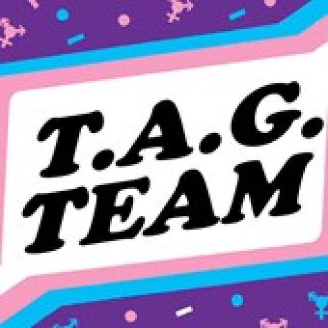 T.A.G. Team logo, black text inside a trans flag colored box, on purple background with light pink and blue confetti